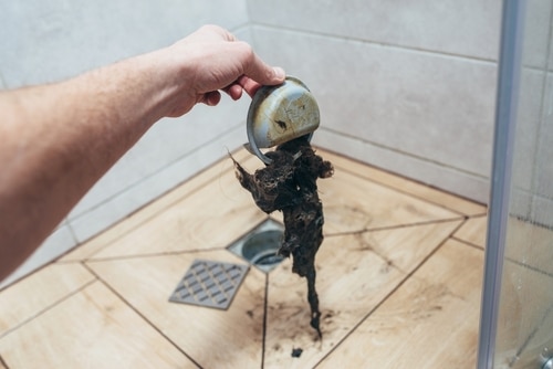 shower drain unclogging, Common Causes of Shower Drain Clogs, DIY Methods for Unclogging a Shower Drain